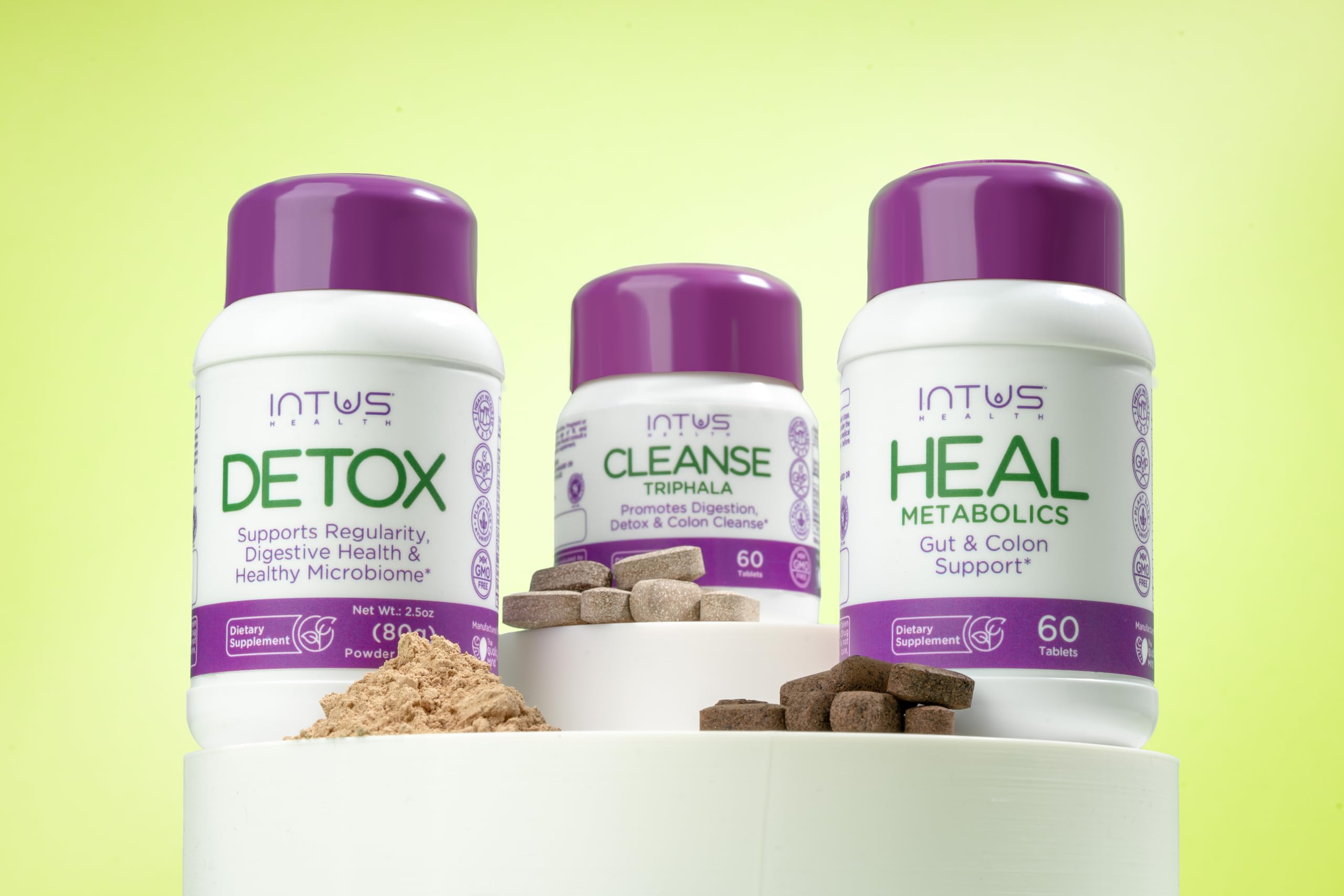 INTUS Detox Box label detail showing Triphala and Amalaki ingredients.