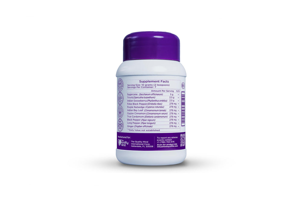 INTUS Detox bottle beside haritaki and bibhitaki herbs for cleansing