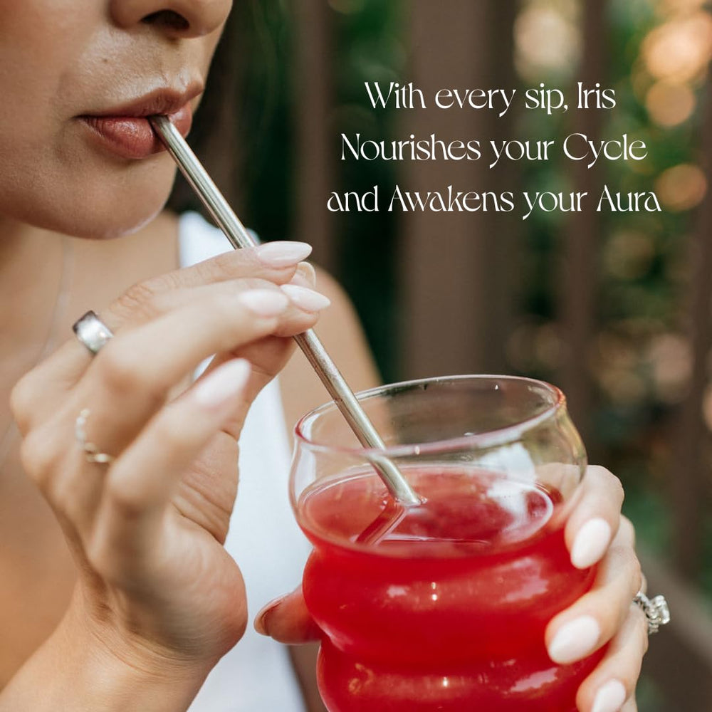 Glass of iced Iris Electrolyte Drink with a light fizz.