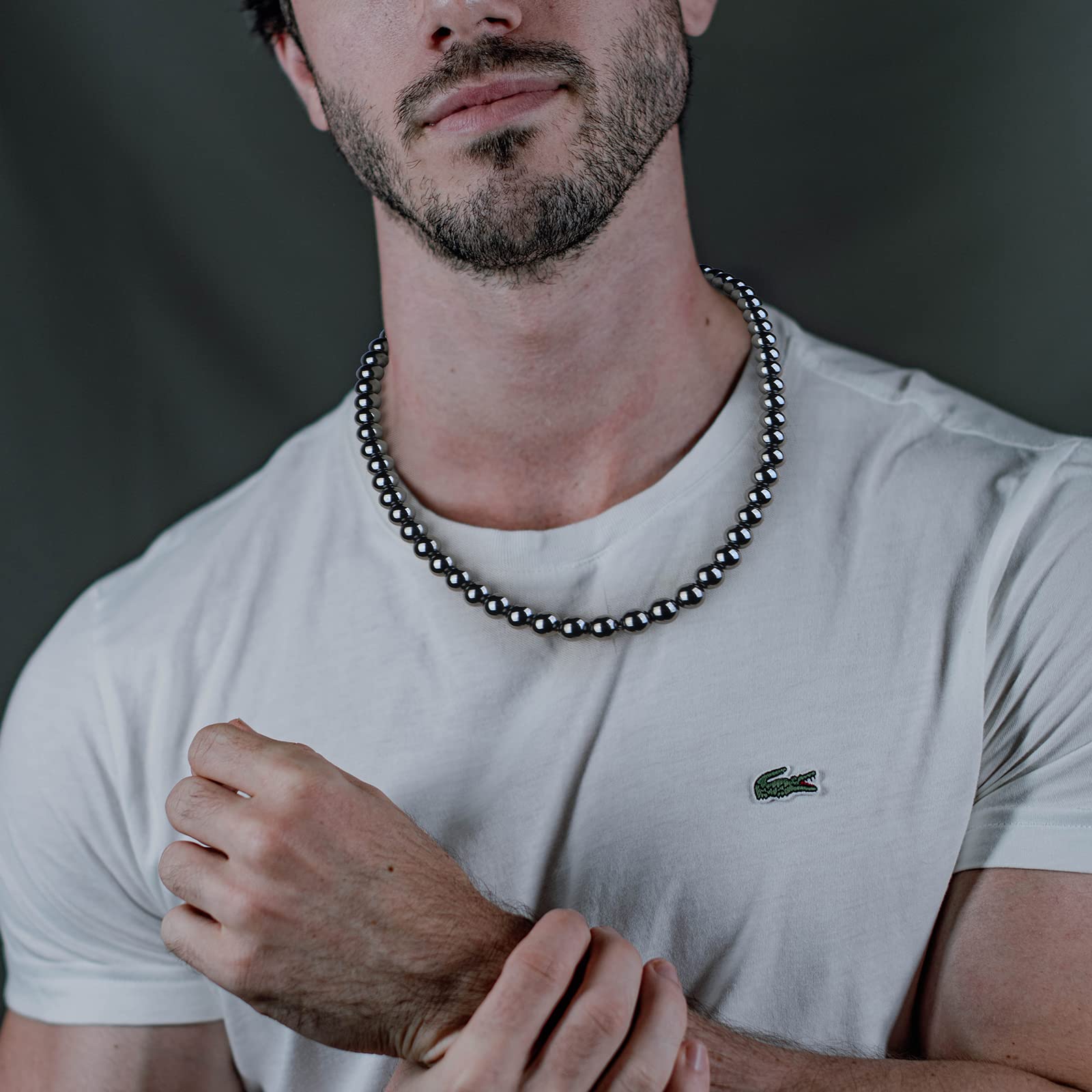 IRUMENG Hematite Necklace with magnetic clasp highlights secure everyday wear and potential energy balance.