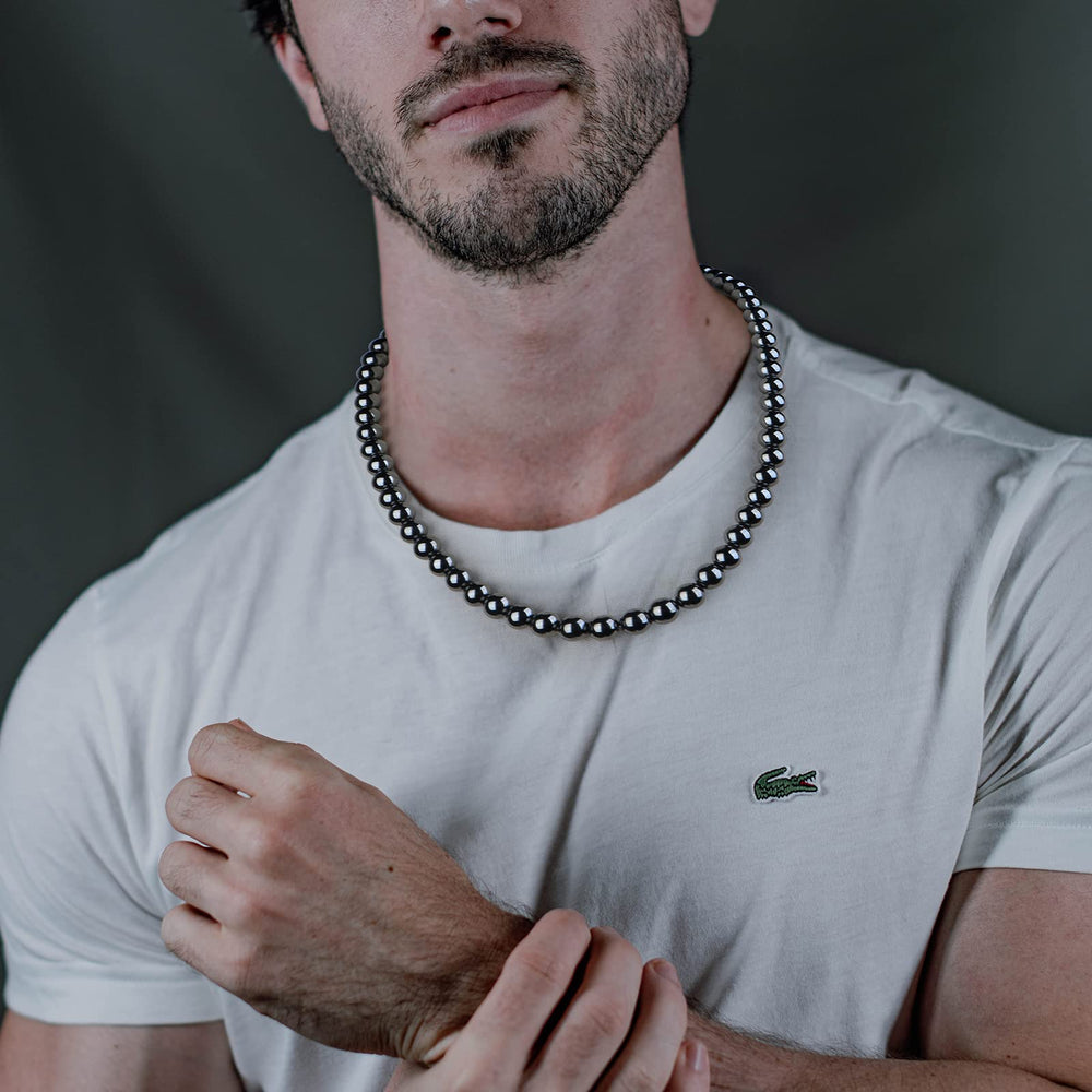 IRUMENG Hematite Necklace with magnetic clasp highlights secure everyday wear and potential energy balance.