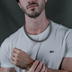 IRUMENG Hematite Necklace with magnetic clasp highlights secure everyday wear and potential energy balance.