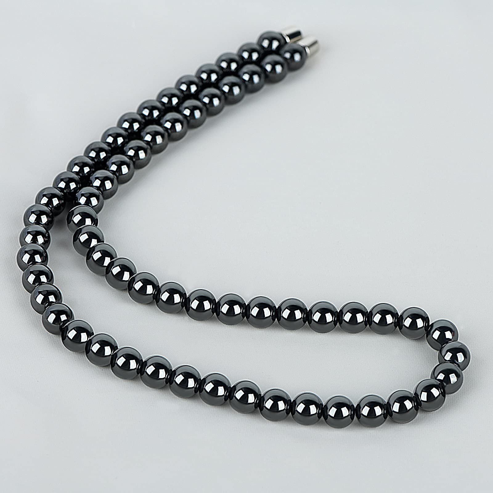 IRUMENG Hematite Necklace worn elegantly supports focus and relaxation during meditation or commute.