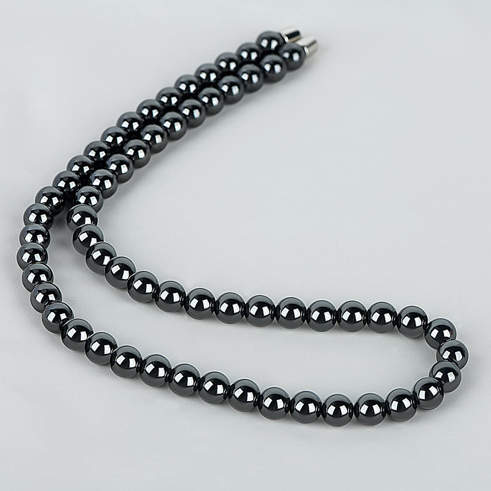 IRUMENG Hematite Necklace worn elegantly supports focus and relaxation during meditation or commute.