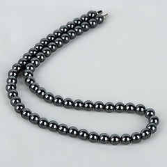 IRUMENG Hematite Necklace worn elegantly supports focus and relaxation during meditation or commute.
