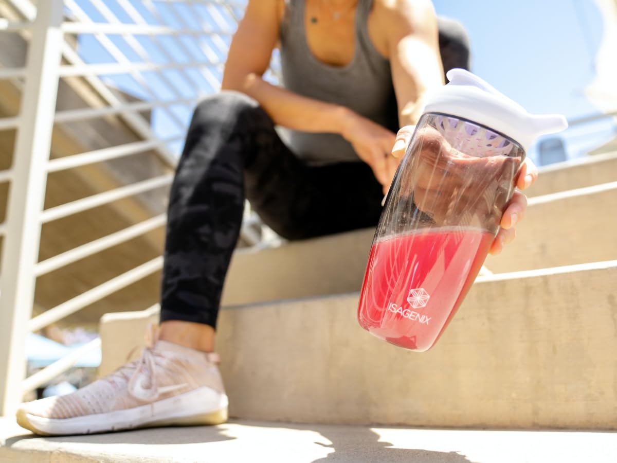 Isagenix AMPED BCAA Plus being stirred with water to fuel workouts