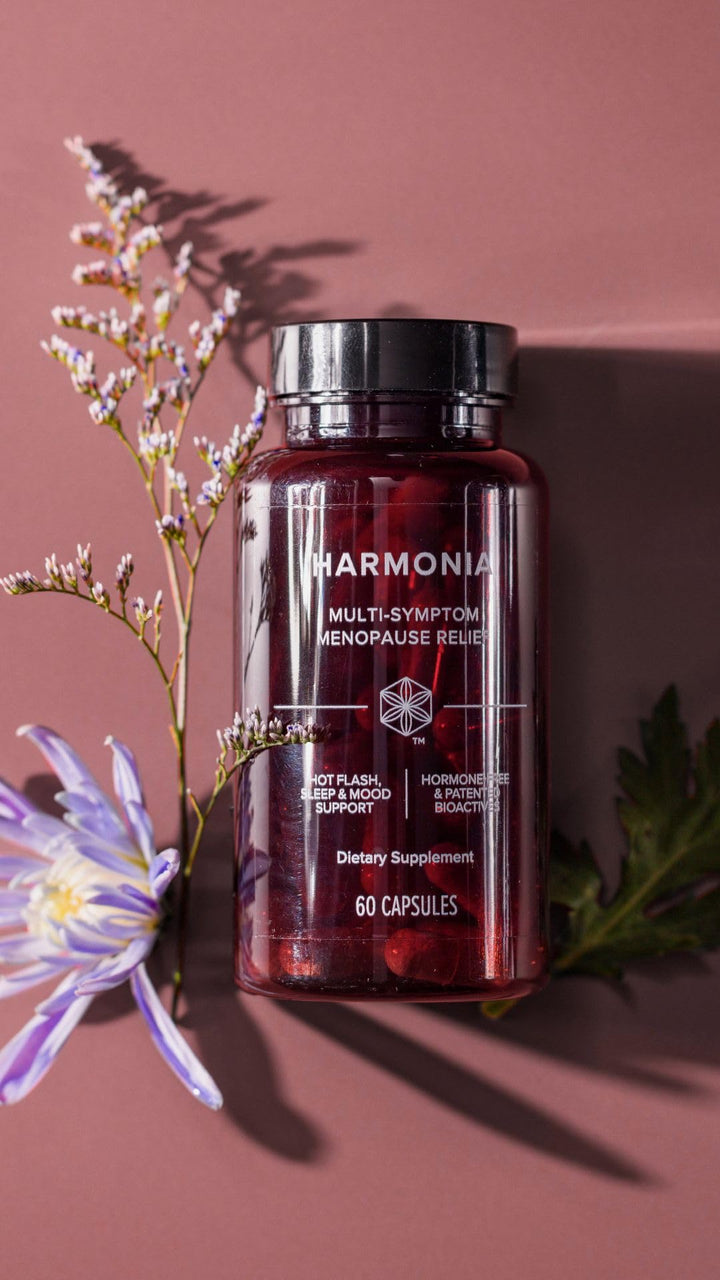 Isagenix Harmonia product against a clean wellness backdrop.