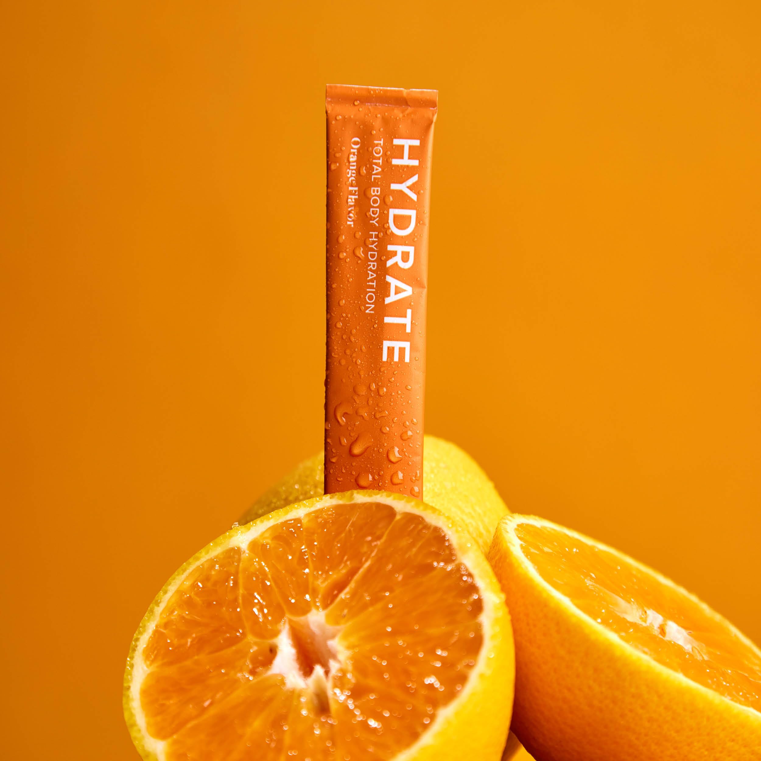 Isagenix Hydrate bottle with stick dissolved in water illustrating easy hydration ritual.