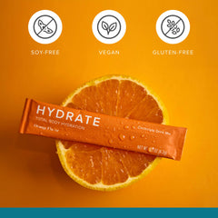 Isagenix Hydrate watermelon stick dissolving in water for sugar-free cooling refreshment.