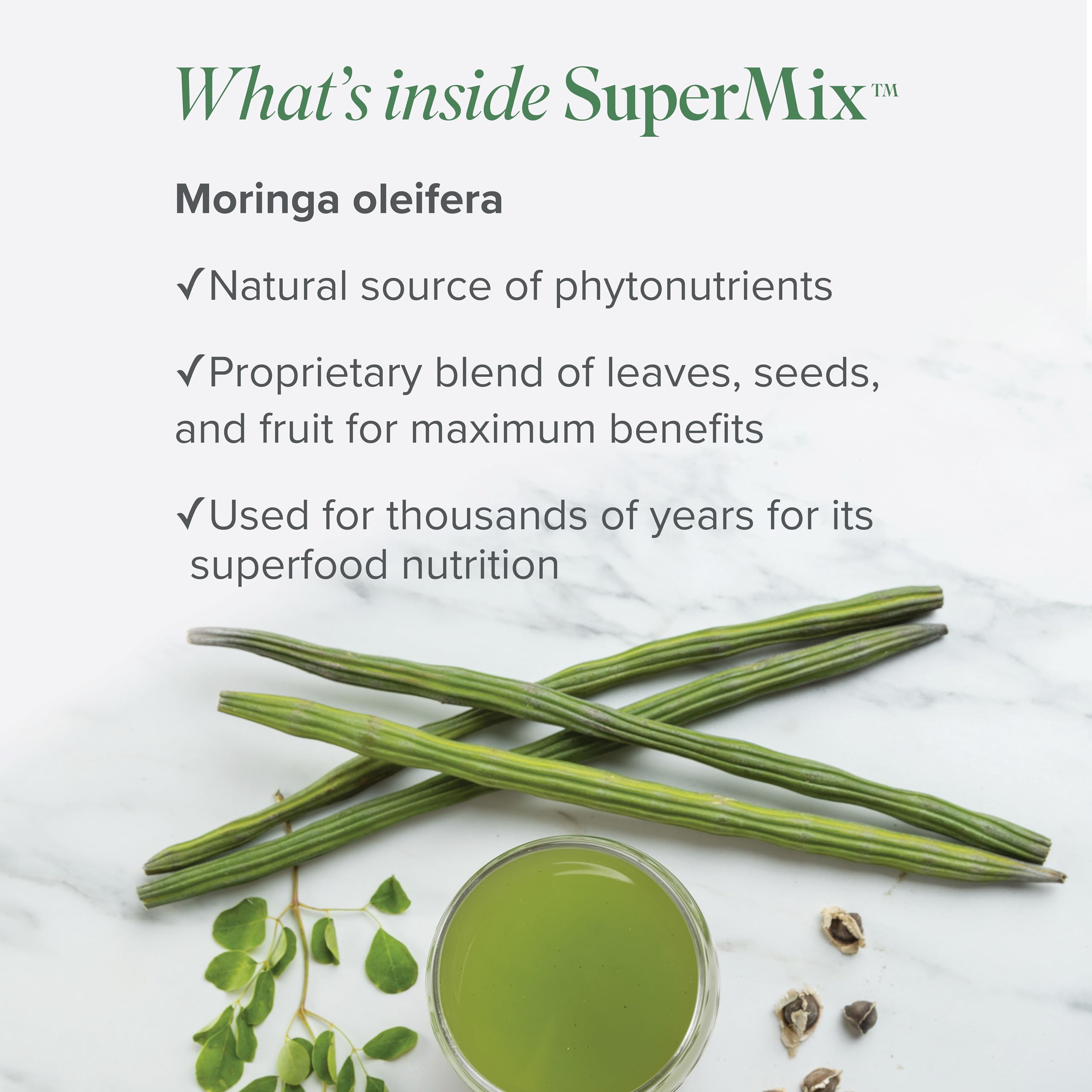 Isagenix SuperMix tropical flavor scoop prepared for a refreshing shake