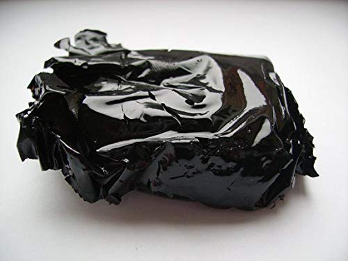ISOP Shilajit resin close-up shows natural texture and consistency.