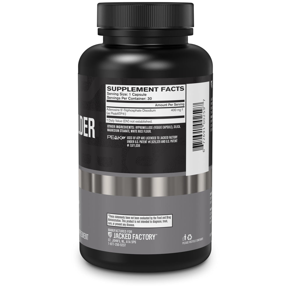 Jacked Factory Essentials Muscle Builder packaging beside workout gear
