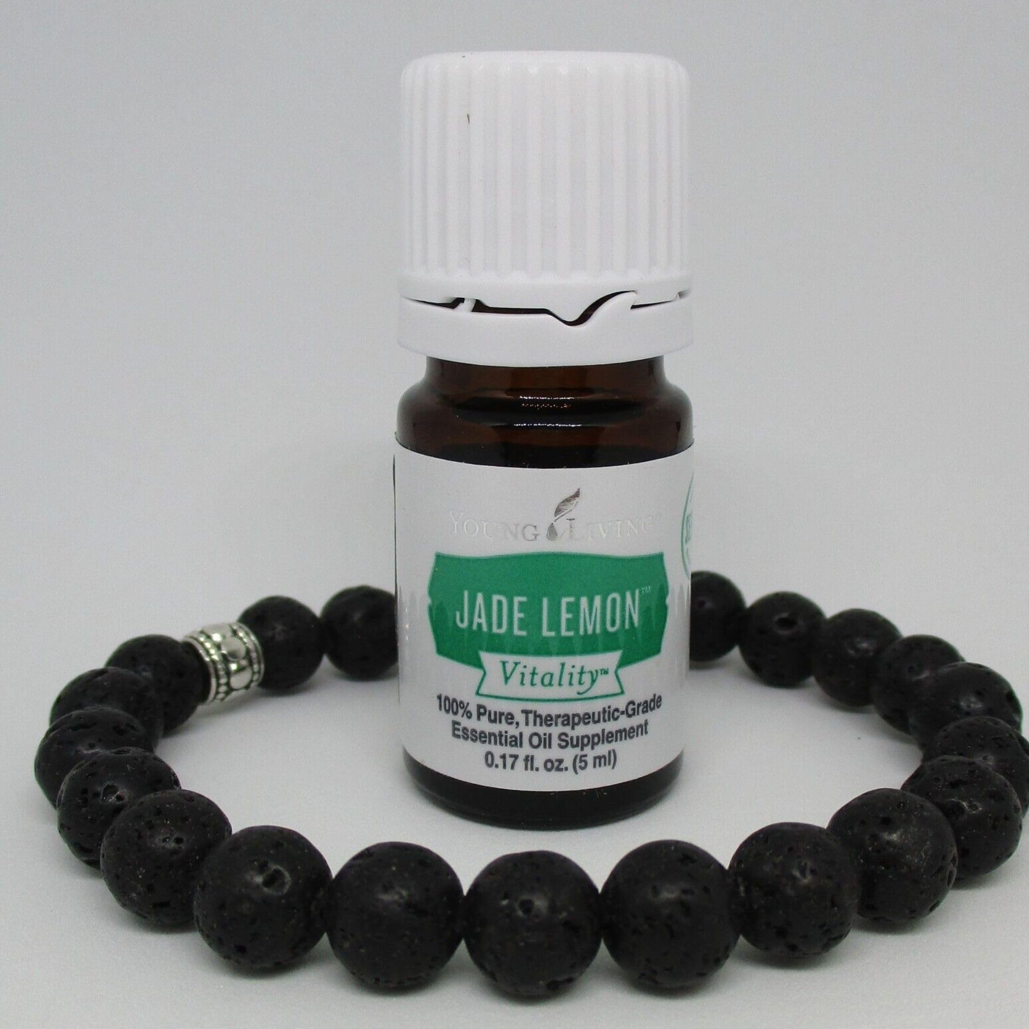 Jade Lemon Vitality bottle pouring a few drops into a beverage
