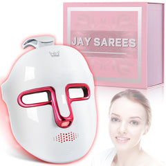 JAY SAREES red-light therapy face mask in white worn with closed eyes for a relaxing routine