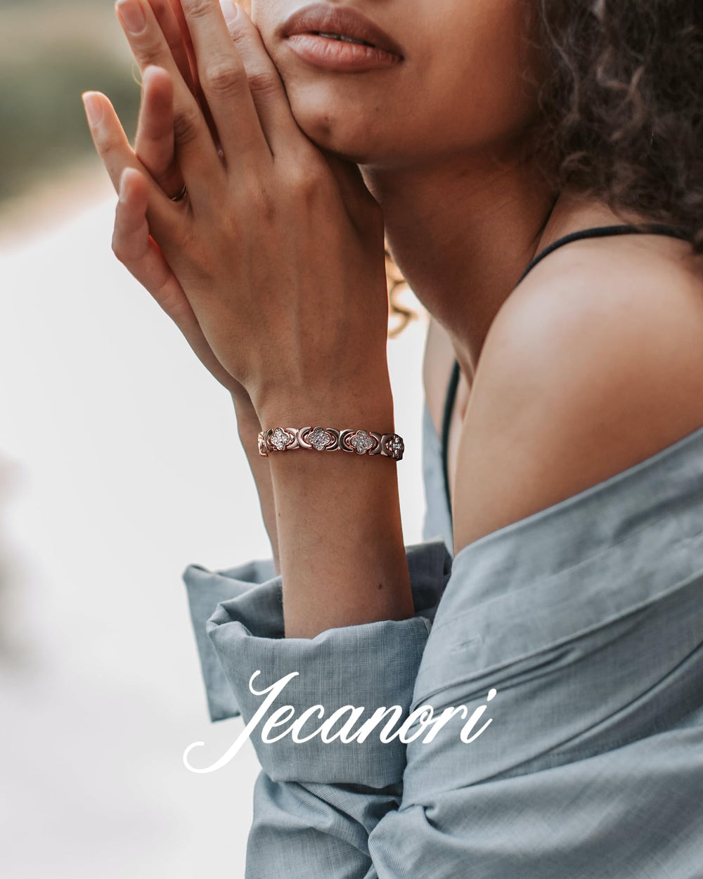 Jecanori copper ring closeup emphasizing four-leaf clover design and versatile style.