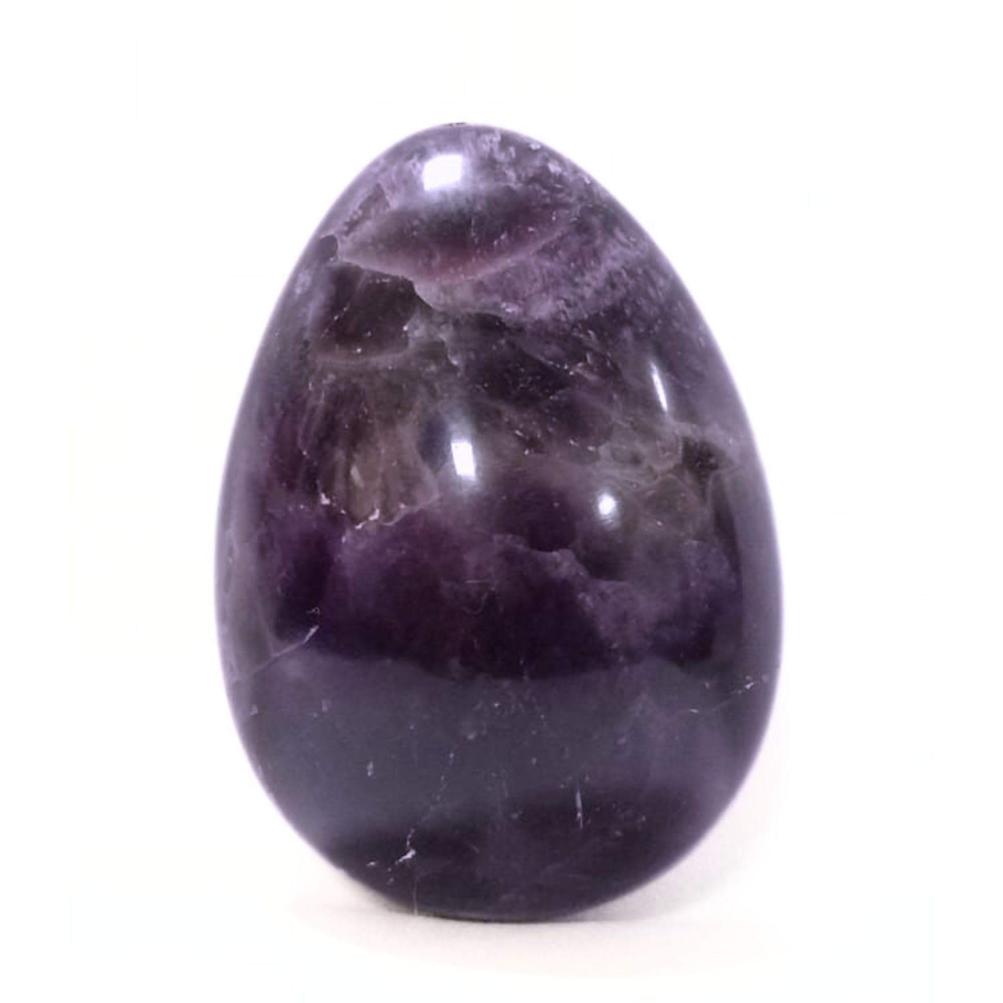 Jet International amethyst egg closeup colors showing natural banding for energy crystals