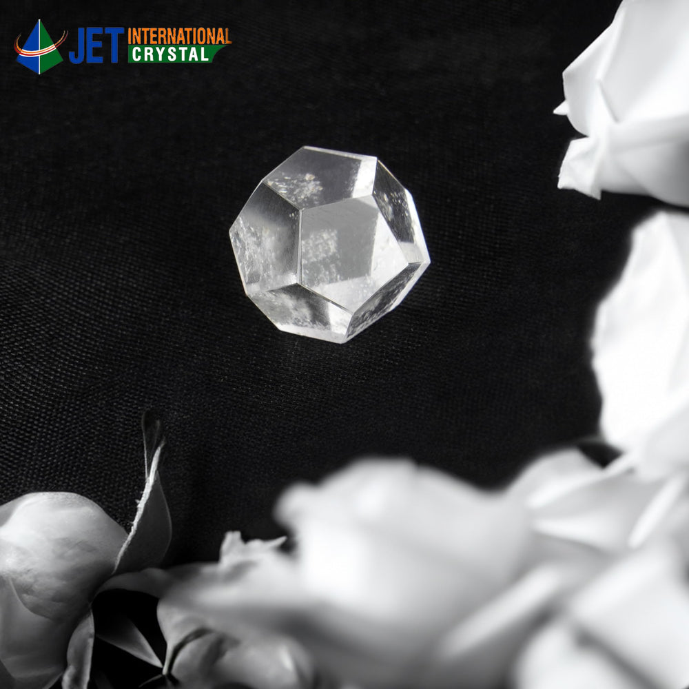 Jet International crystal quartz dodecahedron on an altar for mindful energy.