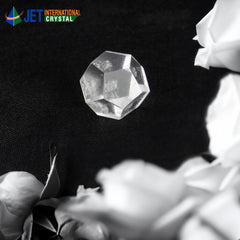Jet International crystal quartz dodecahedron on an altar for mindful energy.