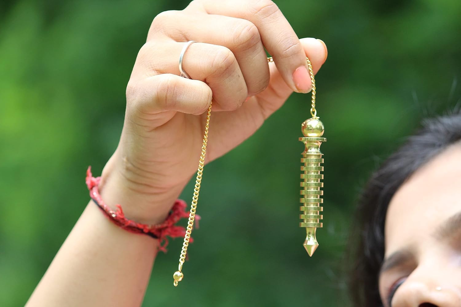 Jet International brass pendulum offers professional radiesthetic readings.