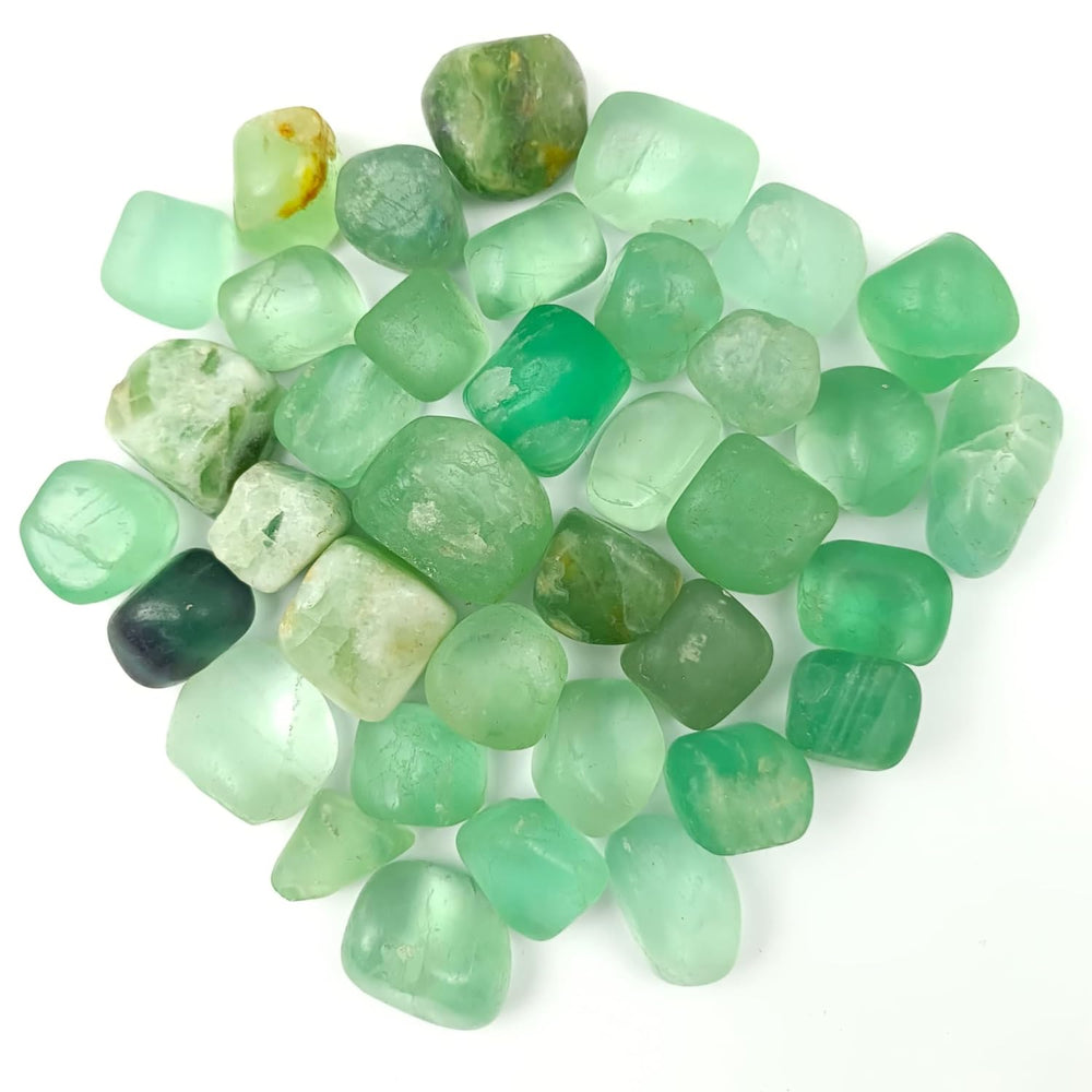 Jet International Jet Green Fluorite tumbled stone on desk enhances focus and calm