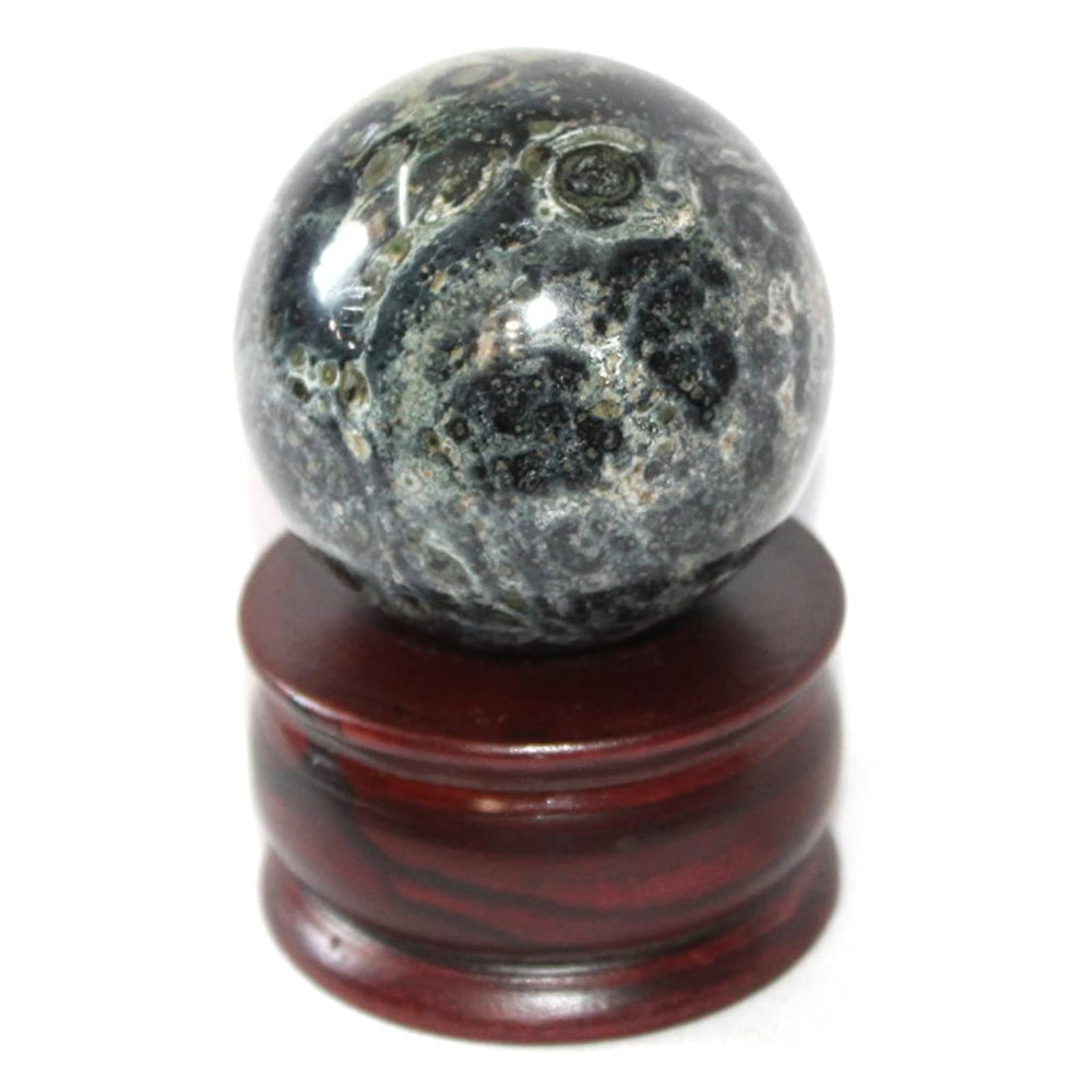 Jet International Kambaba Jasper sphere closeup highlights earthy patterns for grounding energy.