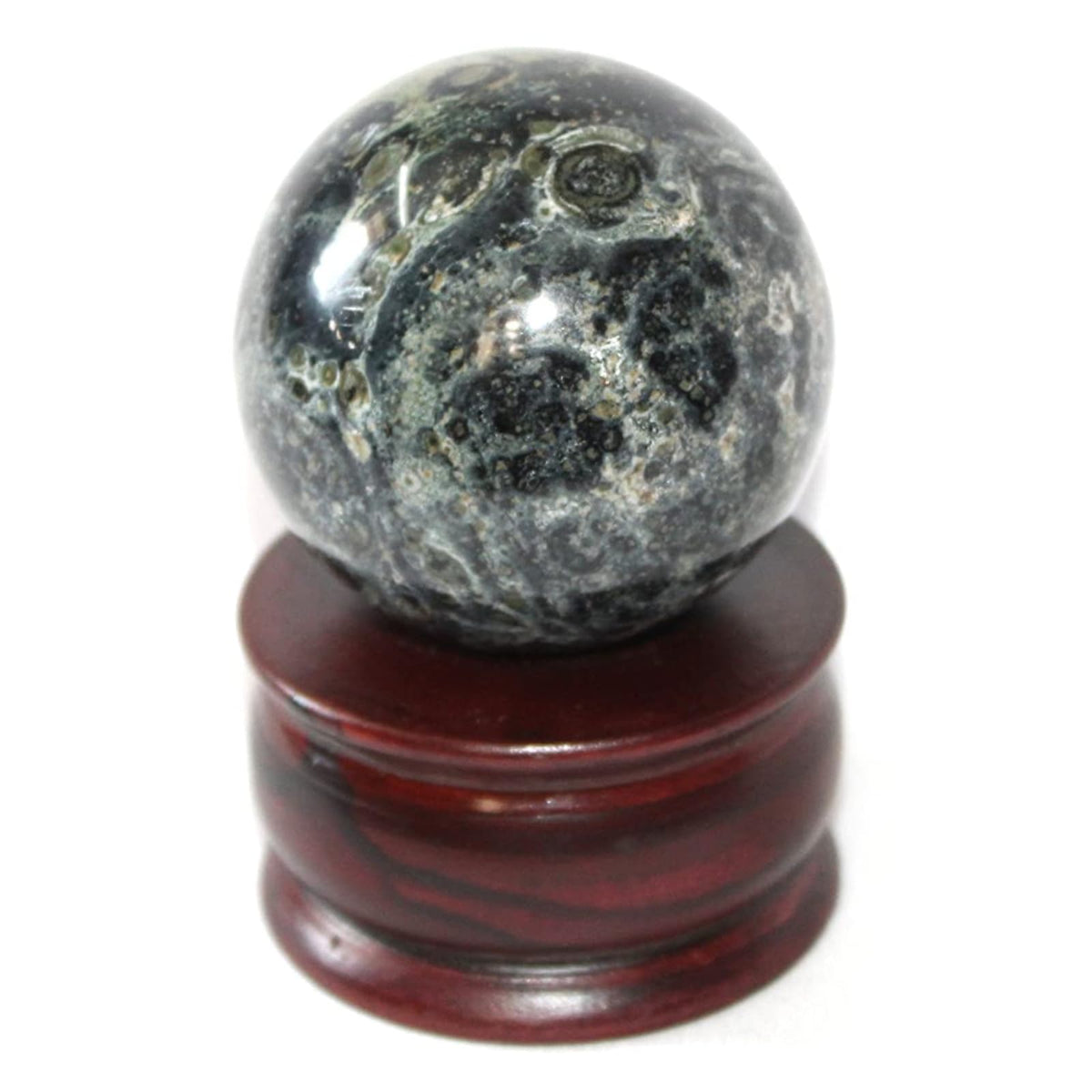 Jet International Kambaba Jasper sphere closeup highlights earthy patterns for grounding energy.