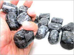 Closeup of Jet International Larvikite stone highlighting iridescence and natural pattern