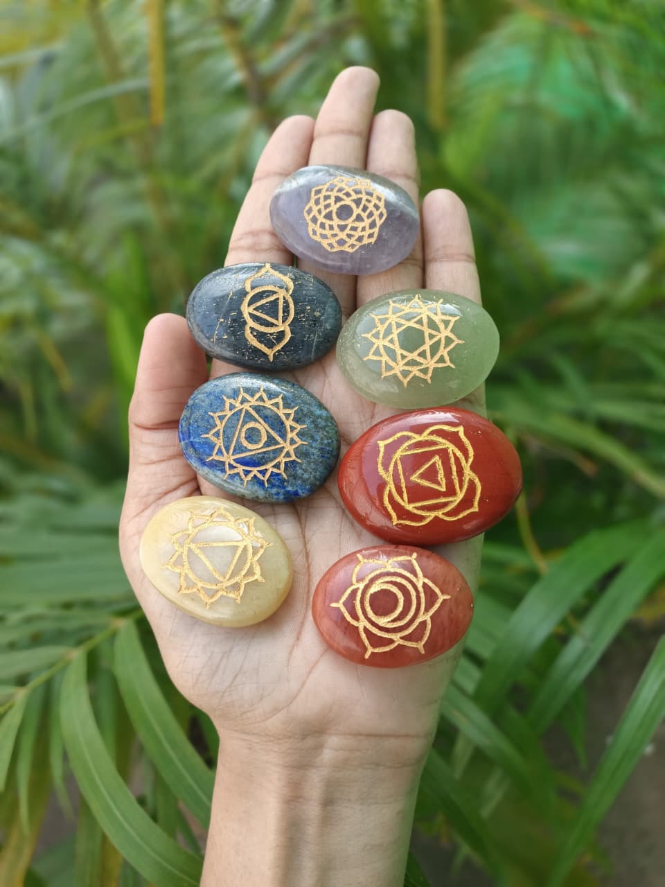 Jet International 7 Chakra Oval Reiki Set red jasper close-up for grounding and energizing sessions