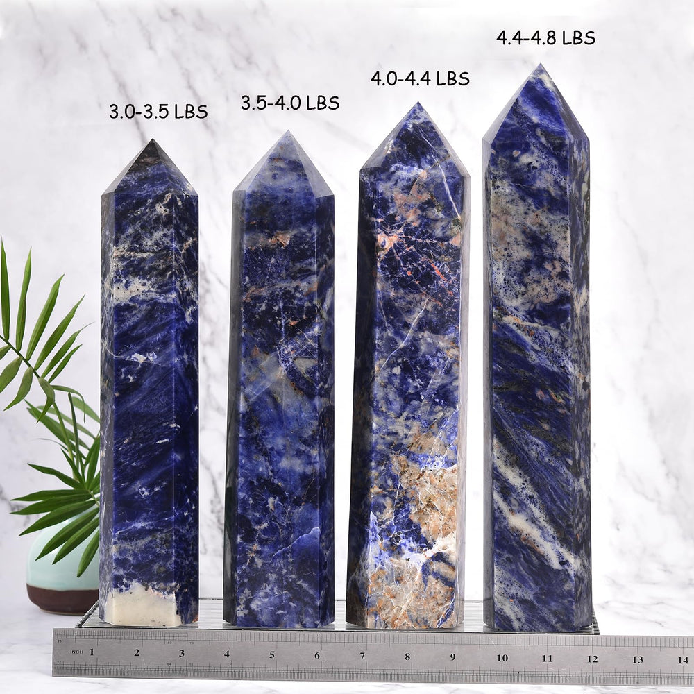 JIC Gem blue sodalite obelisk tower concentrates energy for reflection.