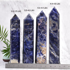 JIC Gem blue sodalite obelisk tower concentrates energy for reflection.