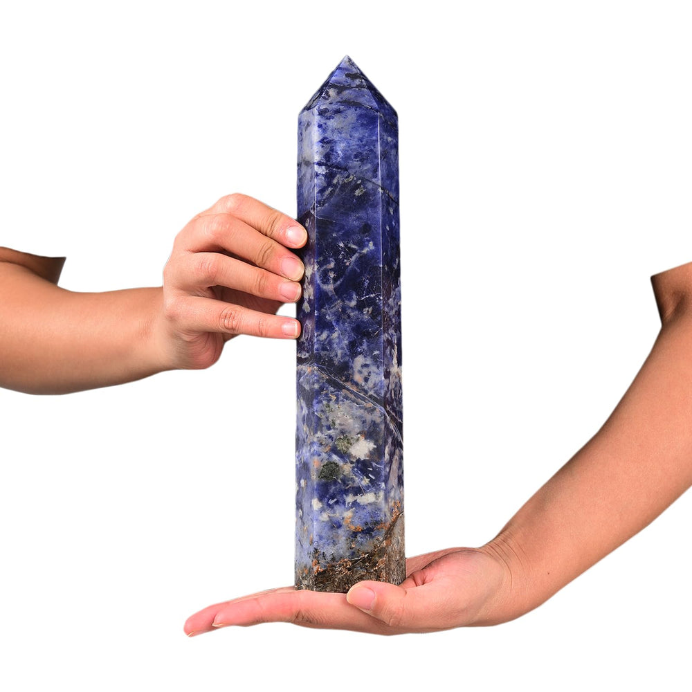 JIC Gem blue sodalite wand close-up highlighting six facets and smooth polish.