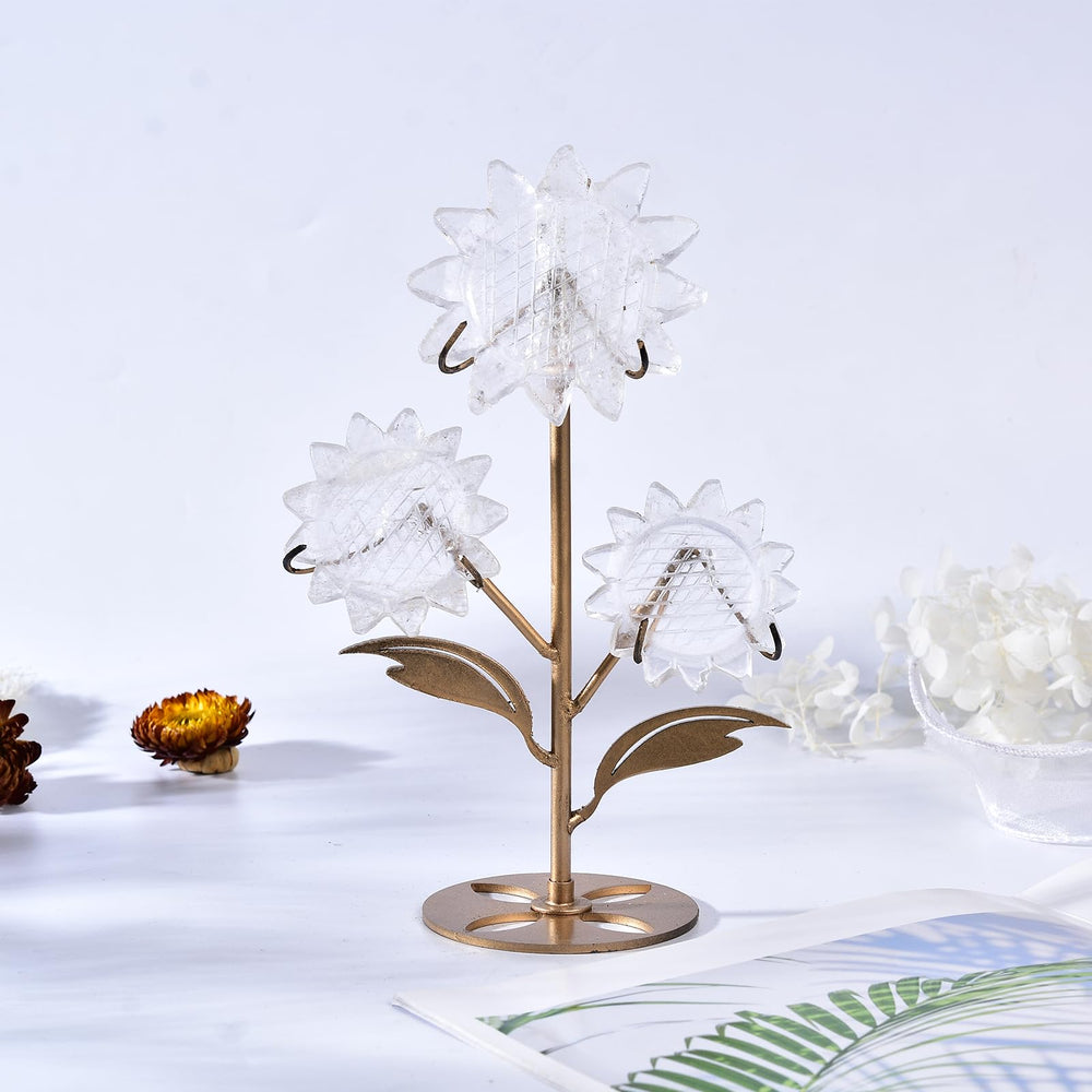 JIC Gem Clear Quartz Sunflower centerpiece on a shelf adds warm ambient light.