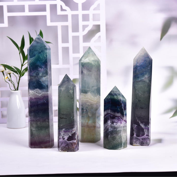 JIC Gem fluorite obelisk highlights natural color for decorative art.