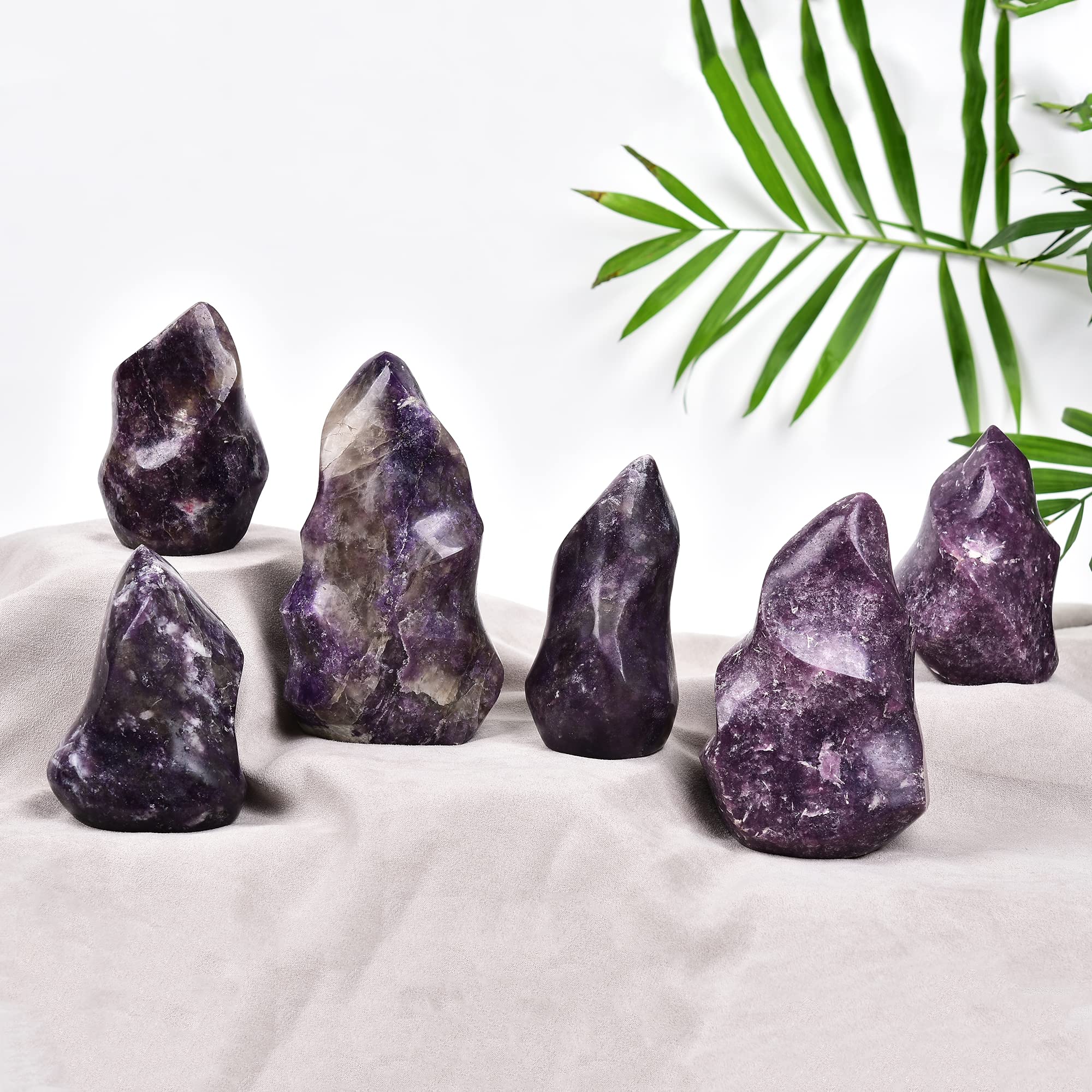 JIC Gem hand carved crystal tower brings natural beauty to shelves.