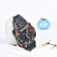 JIC Gem natural geode crystal decor enhances shelves with shimmering facets.