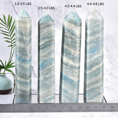 JIC Gem natural trolleite quartz wand in vivid natural color.