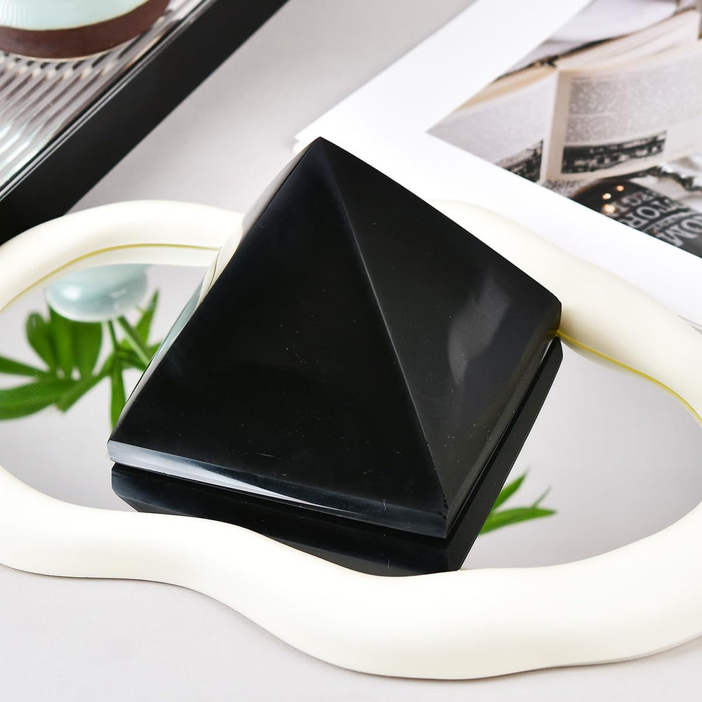 JIC Gem Natural Obsidian Pyramid closeup reveals natural texture and glossy polish.