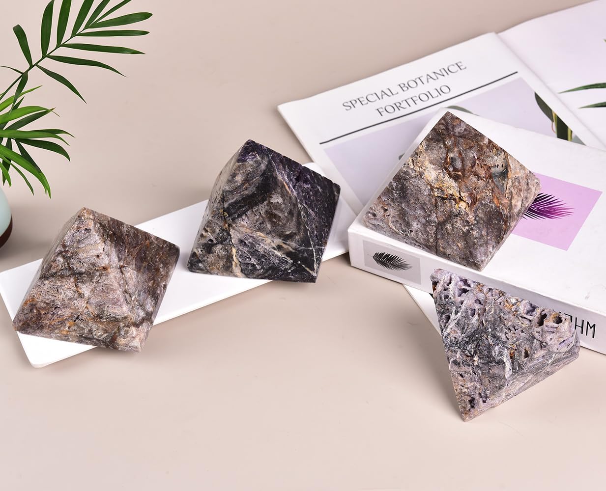 JIC Gem purple sphalerite geode pyramid in a yoga space enhances ambiance