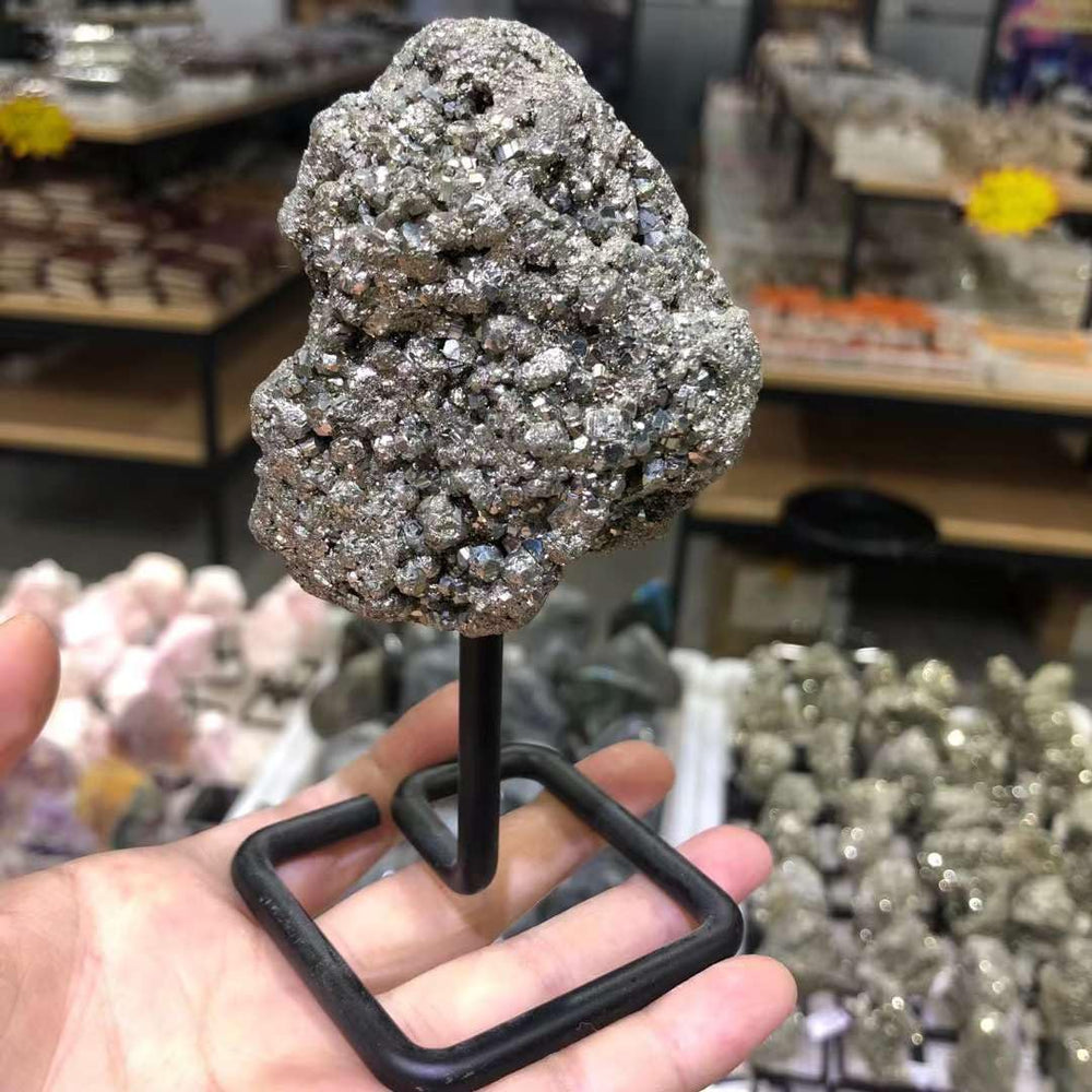 JIC Gem pyrite crystal close-up showing natural texture and sparkle.
