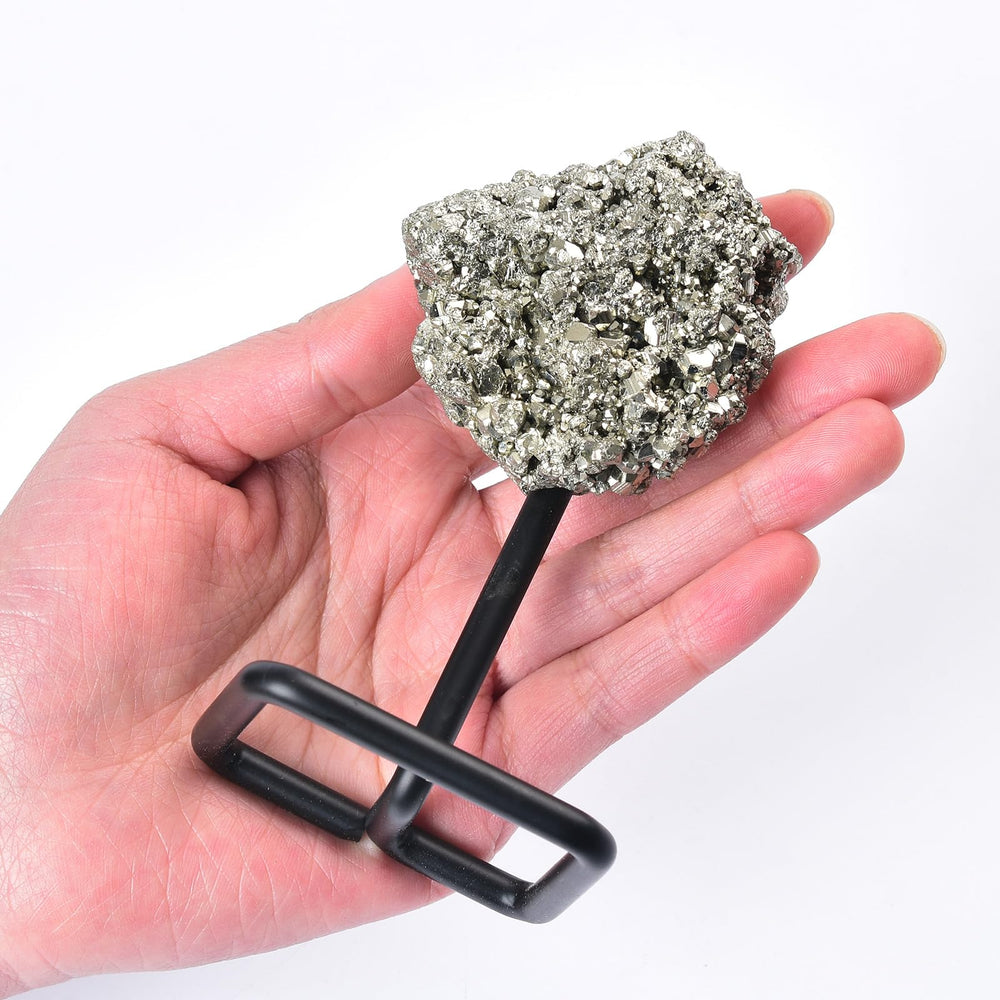 JIC Gem pyrite crystal stand in garden, decorative outdoor focal point.