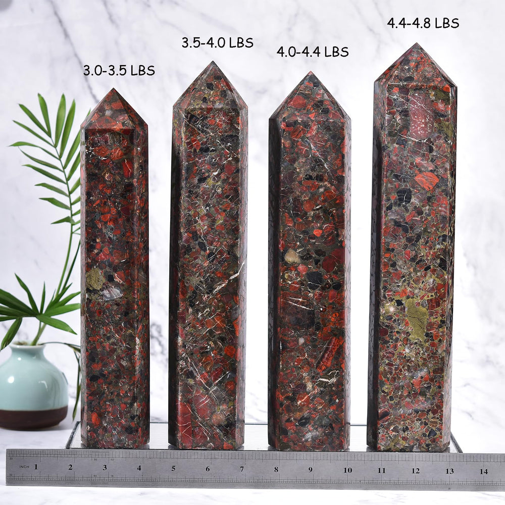 JIC Gem red agate obelisk tower close-up highlights facets and natural color for visual inspiration.