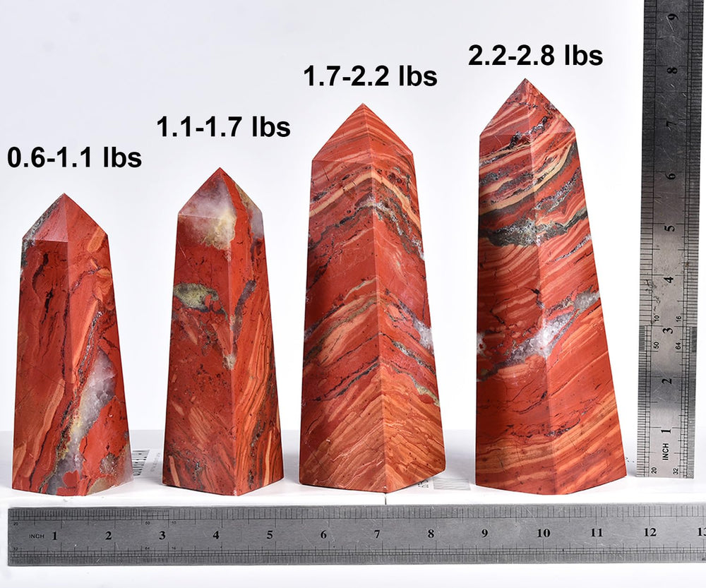 JIC Gem red jasper tower on wood base with natural texture and display appeal.