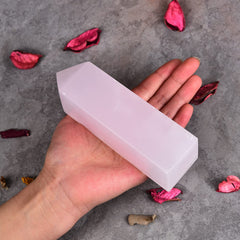 JIC Gem rose calcite tower complements room decor and spiritual practice spaces.