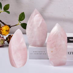 JIC Gem Rose Quartz Crystal Tower closeup, showcasing natural color and hand-polished shine.