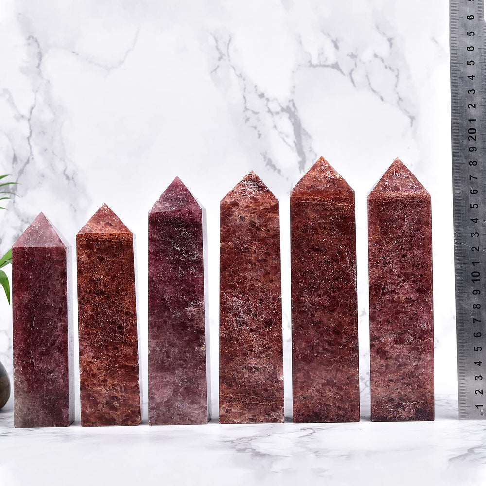 JIC Gem wand close-up emphasizing natural facets and rosy hue for display