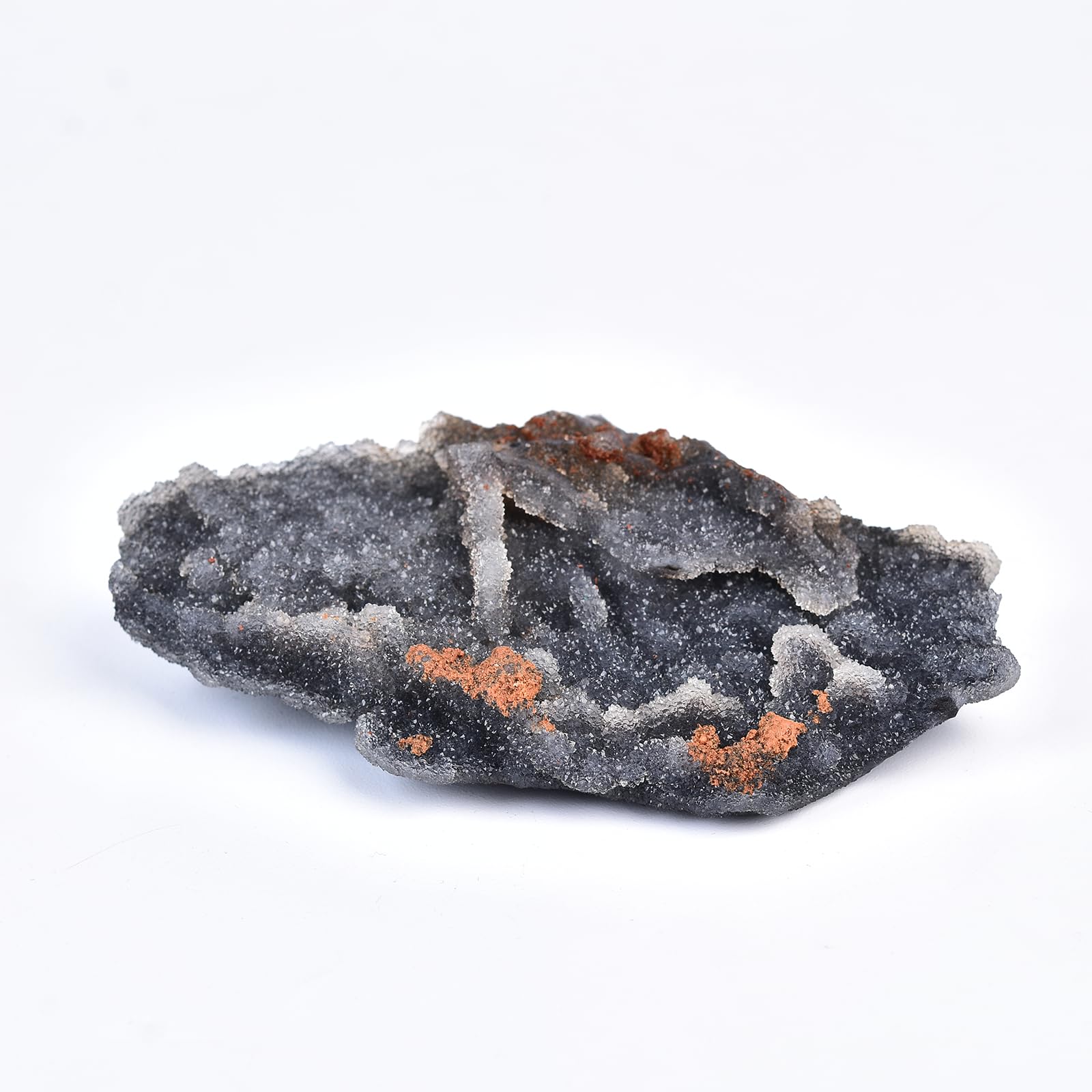 JIC Gem white and black sphalerite stone on display supports calming ambience.