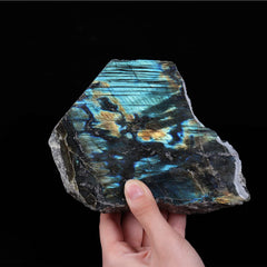 JIC Gem worry stone Labradorite to promote calm on desk or shelf.