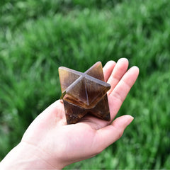 JIC Gem Yellow Fluorite Merkaba on display enhances decor with natural beauty.