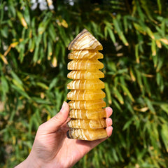 JIC Gem yellow fluorite pagoda decor enhances office ambiance.