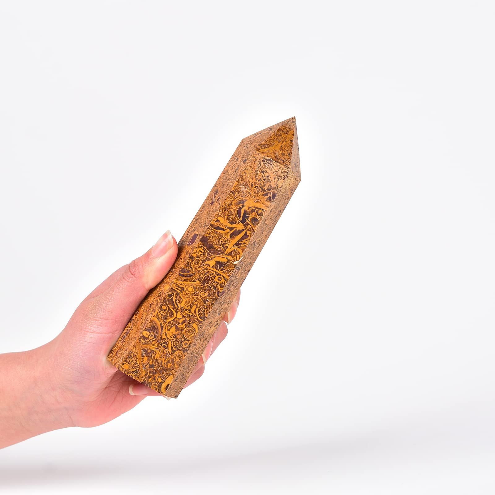 JIC Gem hexagonal crystal tower enhances concentration in meditation spaces.